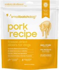 Smallbatch Pork Recipe freeze-dried raw sliders for dogs in a yellow and white resealable bag, shown from the front on a white background.
