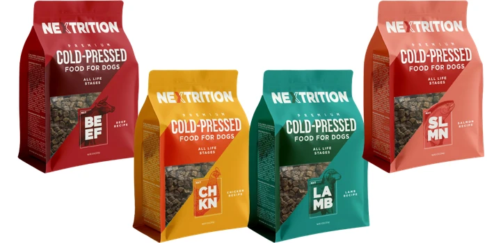 Nextrition Cold-Pressed Dry Dog Food Review showing Beef, Chicken, Lamb, and Salmon recipe bags.
